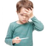 体温計をみる男の子