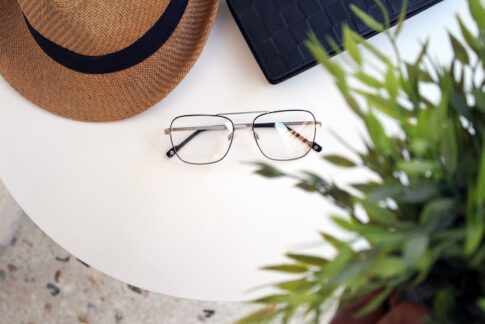 glasses, hat and laptop