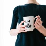 likeaboss woman holding a mug
