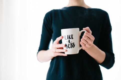 likeaboss woman holding a mug